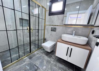 fully-tiled-bathroom-with-shower