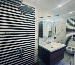 stylish-fully-tiled-bathroom