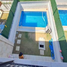 balcony-overlooks-pool-and-garden