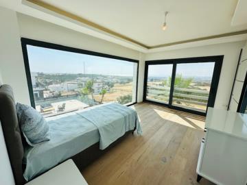 bright-airy-bedroom-with-great-views