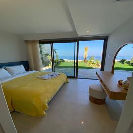 bedroom-with-a-sea-view-and-access-to-garden