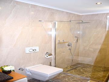 fully-tiled-bathroom-with-shower