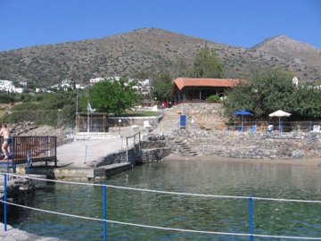 Beach with beach bar, 180m from the plot