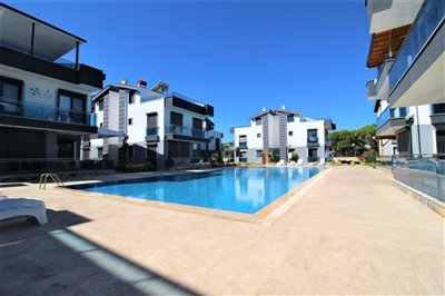 Stunning Triplex Villa For Sale in Didim - Communal pool and large sun terraces