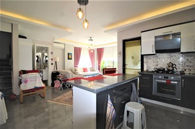 Stunning Triplex Villa For Sale in Didim - Modern kitchen through to lounge