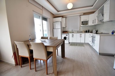 Ideally Located Fethiye Apartment For Sale - View of dining area through to the kitchen