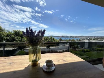 Sea View Bodrum Apartment In Bardakci Koyu For Sale – The perfect place to unwind with a coffee