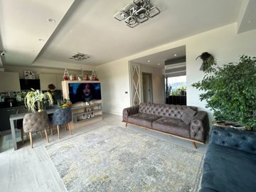 Sea View Bodrum Apartment In Bardakci Koyu For Sale – Very spacious lounge through to kitchen