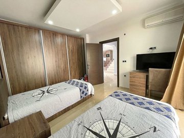 A Hillside Apartment In Alanya For Sale - A gorgeous twin room with storage