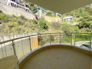 A Hillside Apartment In Alanya For Sale - A shady balcony from the twin room