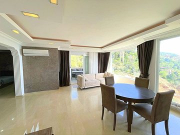 A Hillside Apartment In Alanya For Sale - Huge living space with ambient lighting