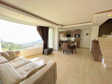 A Hillside Apartment In Alanya For Sale - Living space to the kitchen