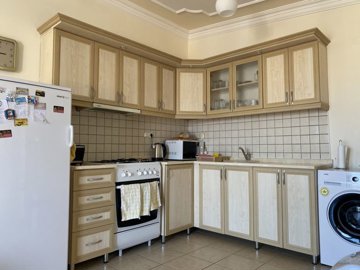 Fully Furnished Duplex Apartment In Didim For sale - Kitchen with plenty of storage and work surfaces