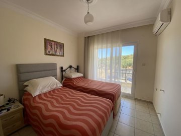 Fully Furnished Duplex Apartment In Didim For sale - Lovely double bedroom with a balcony with seating