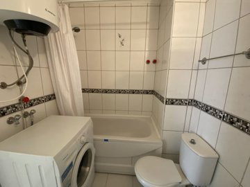 A Must-See Fully Furnished Apartment In Didim For sale - Family bathroom with a bathtub