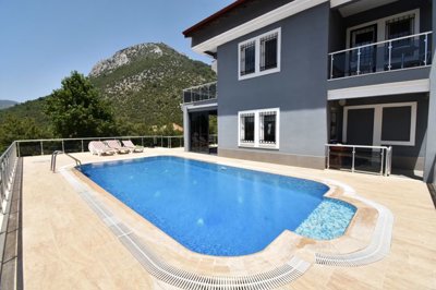 Expansive Detached Villa In Fethiye For Sale with Pool - A private pool with sun terraces