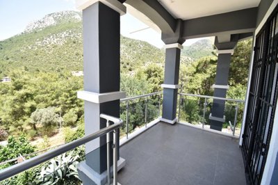 Expansive Detached Villa In Fethiye For Sale with Pool - Bedroom balcony with endless nature views