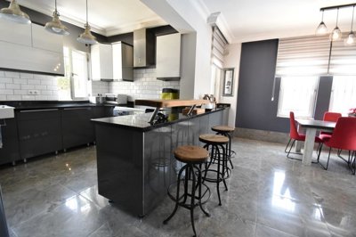 Expansive Detached Villa In Fethiye For Sale with Pool - Modern stylish kitchen with built-in white goods