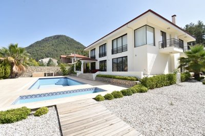 An Immaculate Detached Villa  For Sale with Pool In Fethiye - Main view of the private villa and huge plot with pool