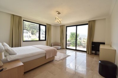 An Immaculate Detached Villa  For Sale with Pool In Fethiye - A beautiful double bedroom with lots of natural light and furnishings
