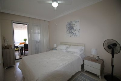 An Unmissable Two-Bed Apartment In Didim For sale - Double bedroom with balcony access