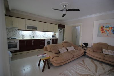 An Unmissable Two-Bed Apartment In Didim For sale - Lounge and modern kitchen