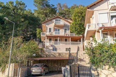 A Minimalistic Attic Duplex Apartment in Gocek For Sale - Desirable roof duplex with car parking and set on the hillside