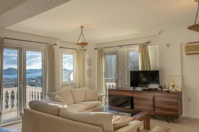 A Minimalistic Attic Duplex Apartment in Gocek For Sale - Lounge area with high-quality furnishings