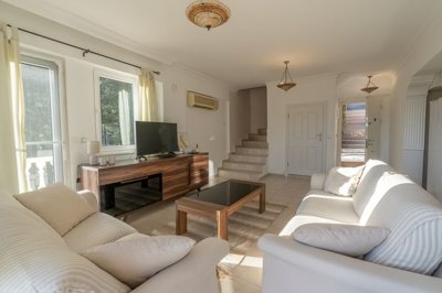 A Minimalistic Attic Duplex Apartment in Gocek For Sale - View from the lounge to the staircase