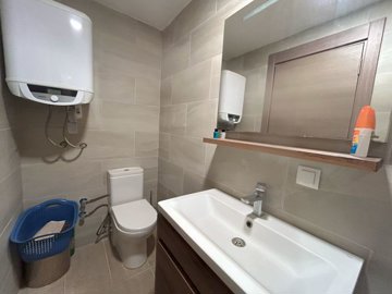 A Modern, Spacious Apartment For Sale On a Small Complex - Electric water heater in the ensuite