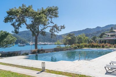 An attractive Seafront Garden Apartment in Gocek For Sale - A picture postcard location on the seafront