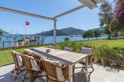 An attractive Seafront Garden Apartment in Gocek For Sale - A lovely veranda with full sea views