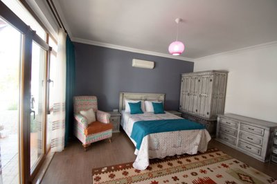 A Gorgeous Bespoke Calis Bungalow For Sale - First spacious bedroom with access to exterior