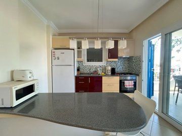 An Outstanding Bodrum Property For Sale - Modern kitchen with breakfast bar