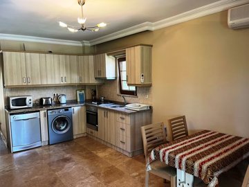 Beautiful Dalyan Ground-Floor Apartment For Sale Near The Town - Dining space and kitchen