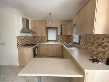 6690eb34e8df9.jpgA Fabulous 2-Bed Top Floor Bodrum Property For Sale - Delightful kitchen with built-in white goods