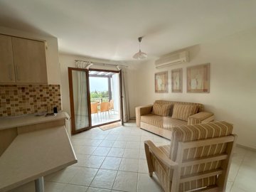 A Fabulous 2-Bed Top Floor Bodrum Property For Sale - A spacious living area with large terrace