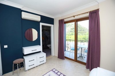 A Colorful Dalyan Villa For Sale With A Private Pool - Master bedroom with ensuite and balcony