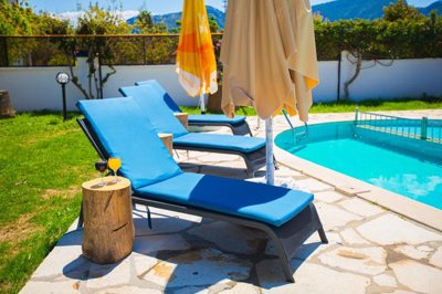 A Colorful Dalyan Villa For Sale With A Private Pool - Natural stone paved sun terraces surround the pool