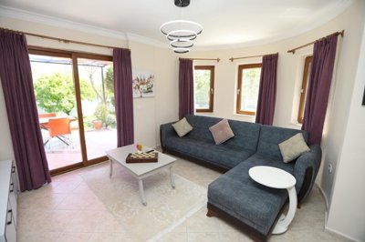 A Colorful Dalyan Villa For Sale With A Private Pool - Light and airy lounge with sun terrace access