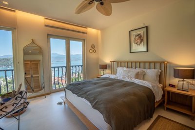A Magnificent Sea View Fethiye Property For Sale - An enticing double bedroom with sea views