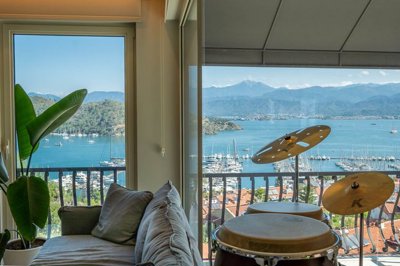 A Magnificent Sea View Fethiye Property For Sale - Lounge out to the balcony with stunning sea views