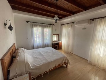 A Traditional Dalyan Property For Sale In Turkey - Double bedroom with beamed ceiling