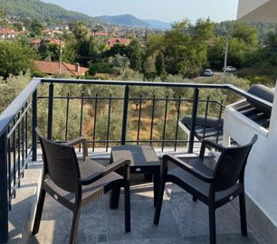 Detached Luxurious Triplex Fethiye Villa For Sale - Bedroom balcony with nature views