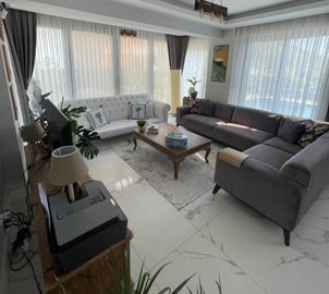 Detached Luxurious Triplex Fethiye Villa For Sale - A fully furnished lounge with plenty of style