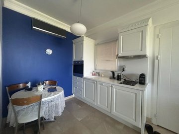 Divine Sea View Bodrum Garden Apartment In Gumusluk For Sale – Fully fitted kitchen and dining area