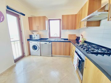 Superb Terrace Apartment In Bodrum For Sale - Modern fully fitted kitchen with built-in white goods