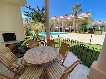 Adorable 3-bedroom semi detached Triplex villa for sale - Terrace with views of the pool and gardens