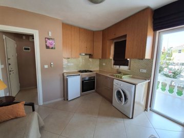 A lovely Ground-Floor Apartment in Dalyan For Sale - Fully fitted kitchen with veranda access