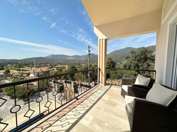 Idyllic Detached Villa In Fethiye For Sale with A Private Pool - Large bedroom balcony with amazing nature views over the valley